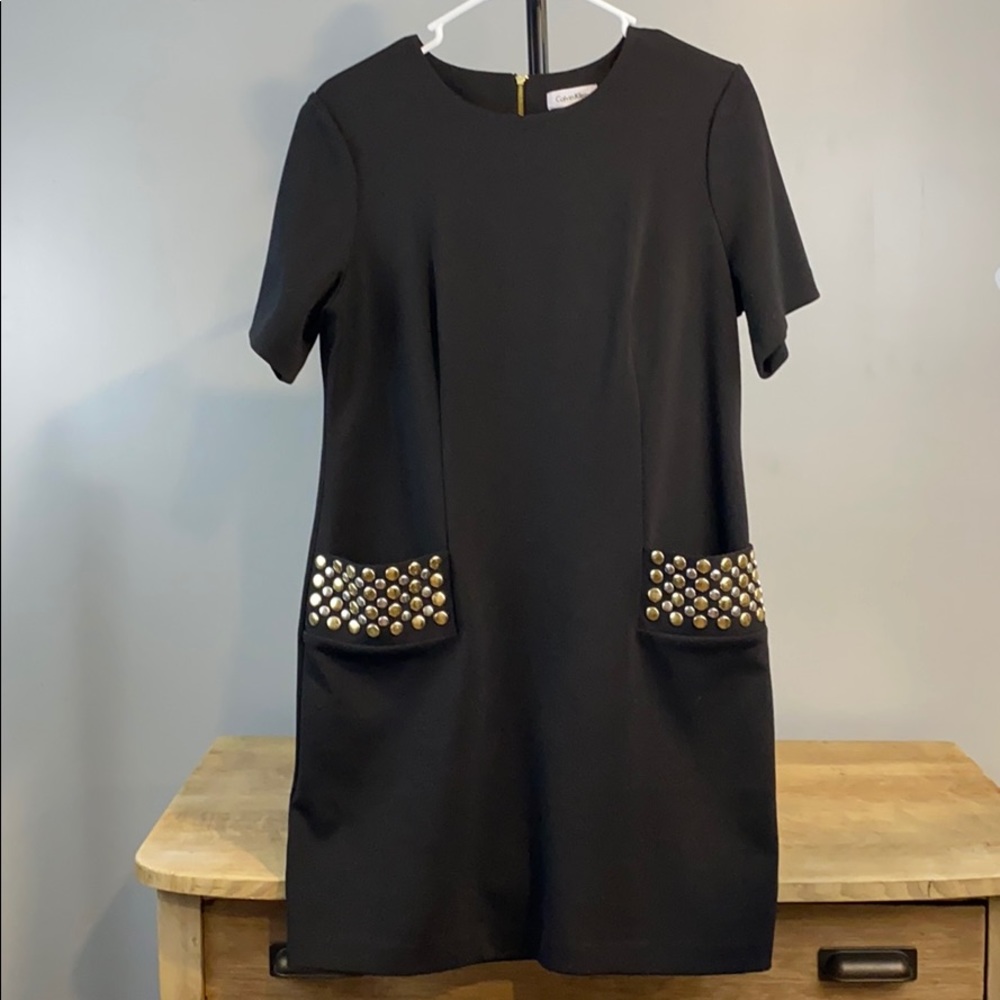 Calvin Klein black dress with gold grommet pockets